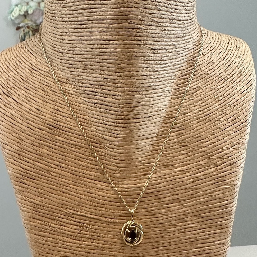 COSTUME jewellery necklace with red stone, cold toned metal